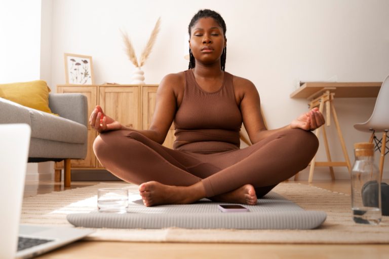 Stress Management: 10 Proven Strategies for a Healthier Mind in 2025 Young adult practicing mindfulness meditation for stress relief, symbolizing emotional resilience in 2025.